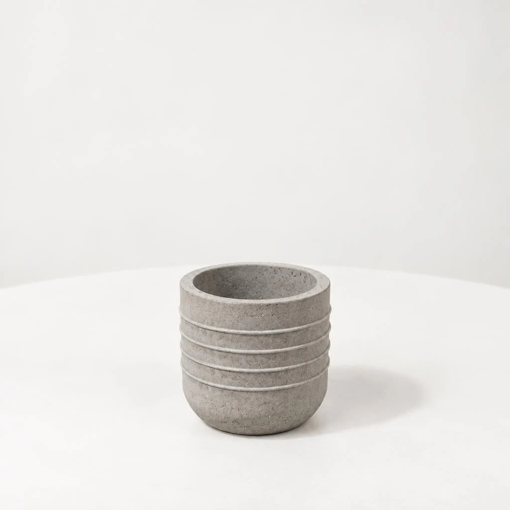 Maceta de concreto Suculenta, textura Anillos, vista de estudio